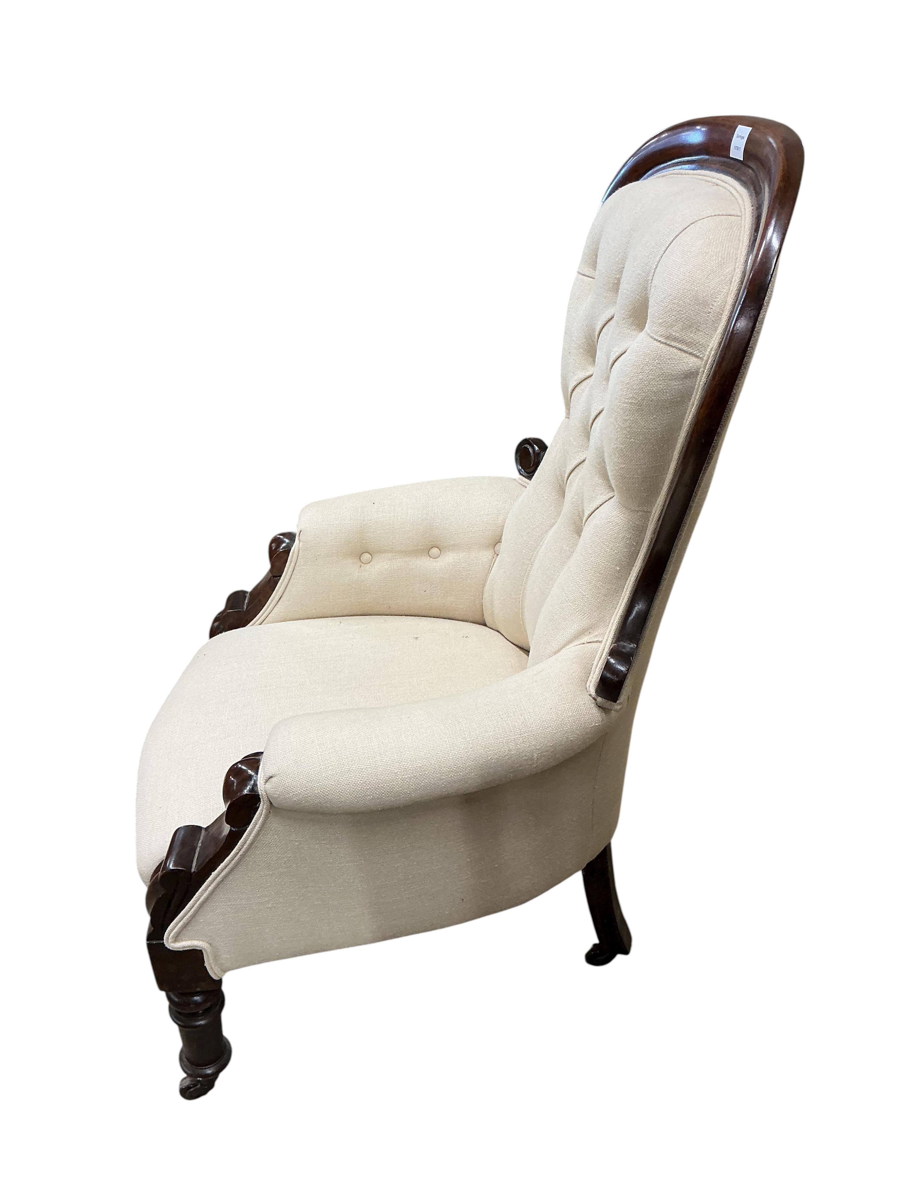A Victorian mahogany upholstered spoonback armchair, width 70cm, depth 66cm, height 104cm